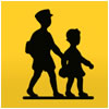 黄色に黒で子供が横断するところを描いた、道路標識です。
