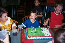 small boys with birthday cake